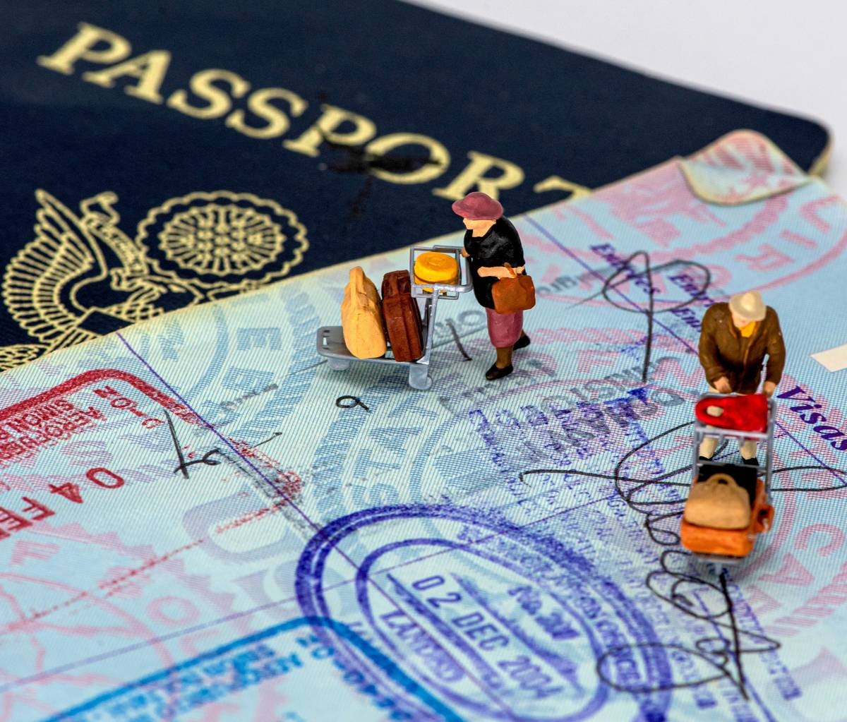 Real-Time Luggage Tracking showing a smartphone screen with a map and moving suitcase icon